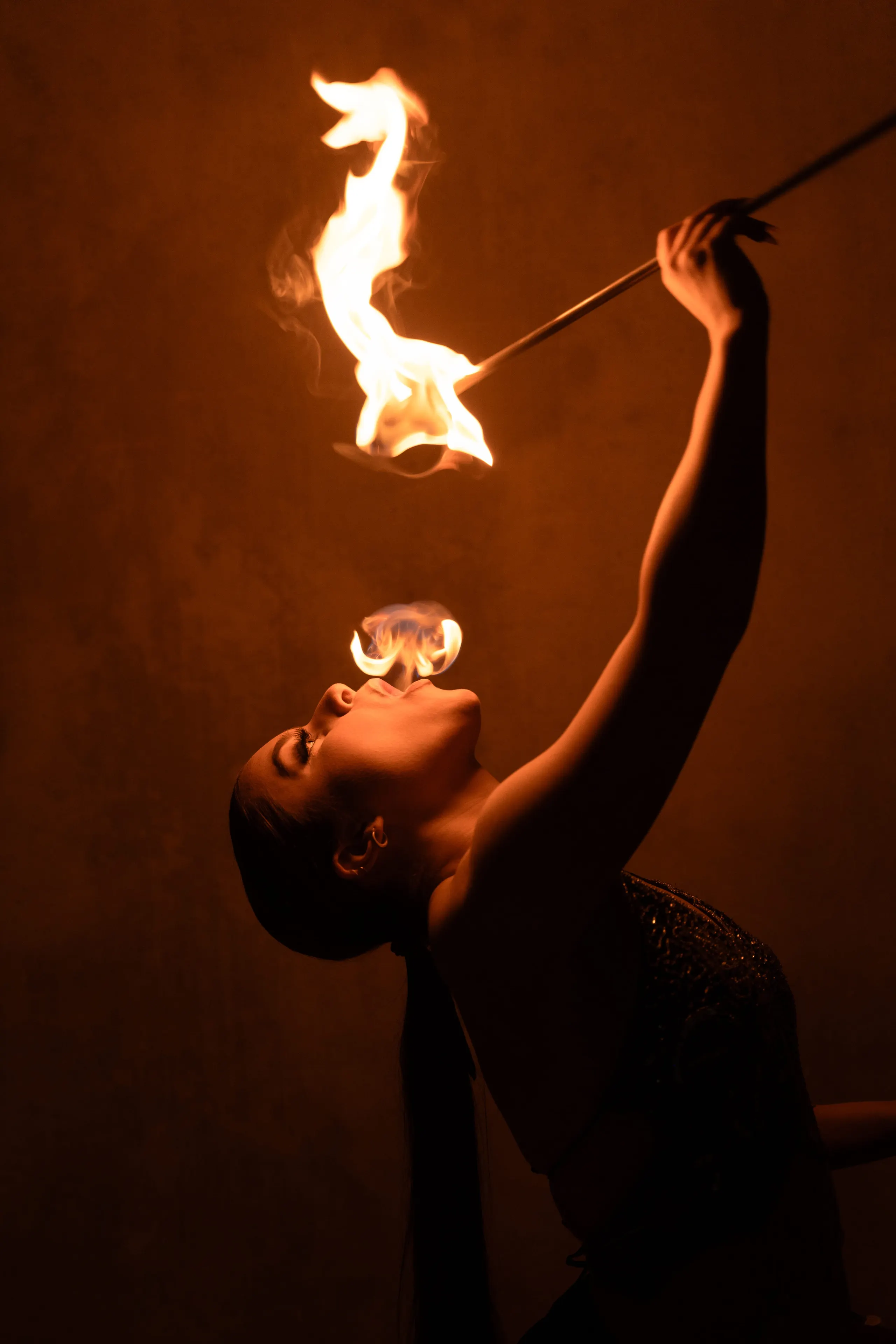 Woman breathing fire
