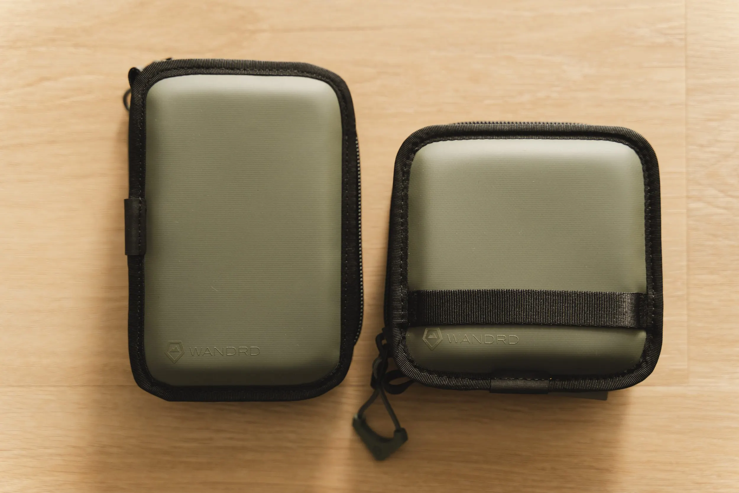 photo of 2 green zip cases